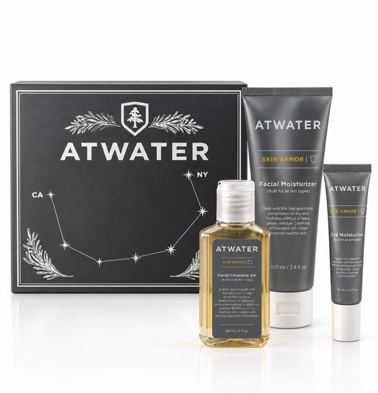 ATWATER skincare gift set featuring a black gift box with white constellation graphics, a facial cleansing gel bottle, a facial moisturizer tube, and a lip moisturizer tube, all on a white background.